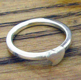 Sterling silver band with heart